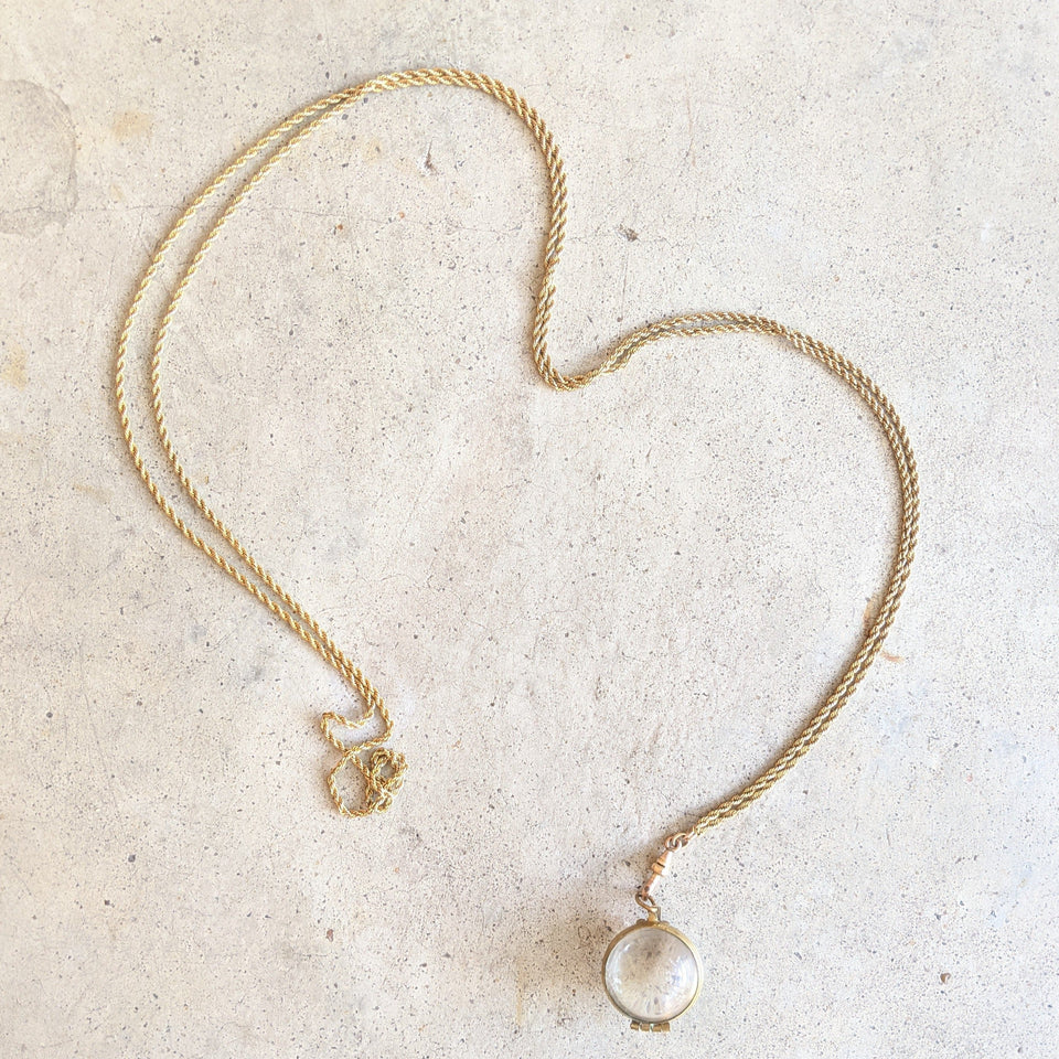 Early 20th c. Pools of Light Locket + Chain